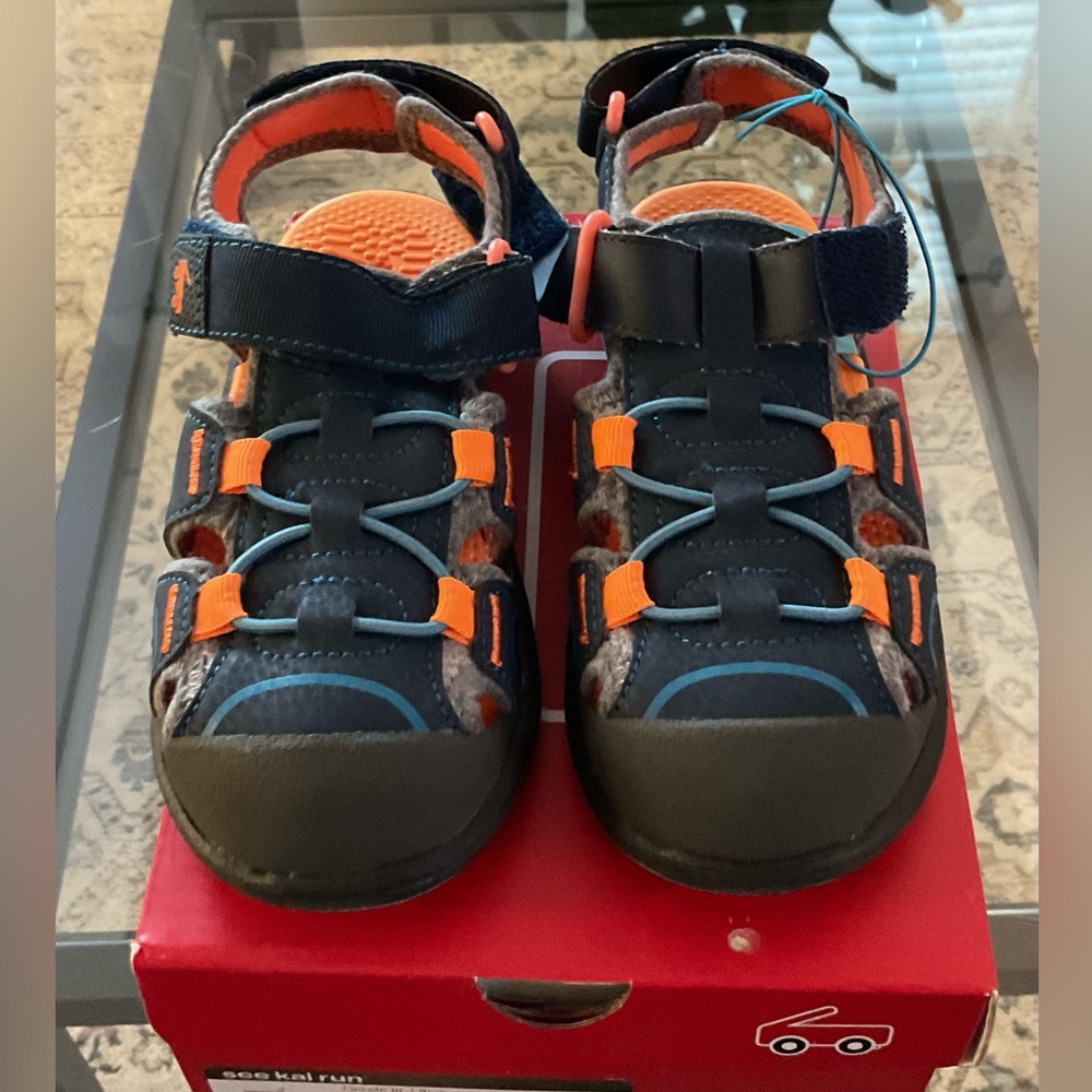 See Kai Run Kids' Black and Orange Sandals
